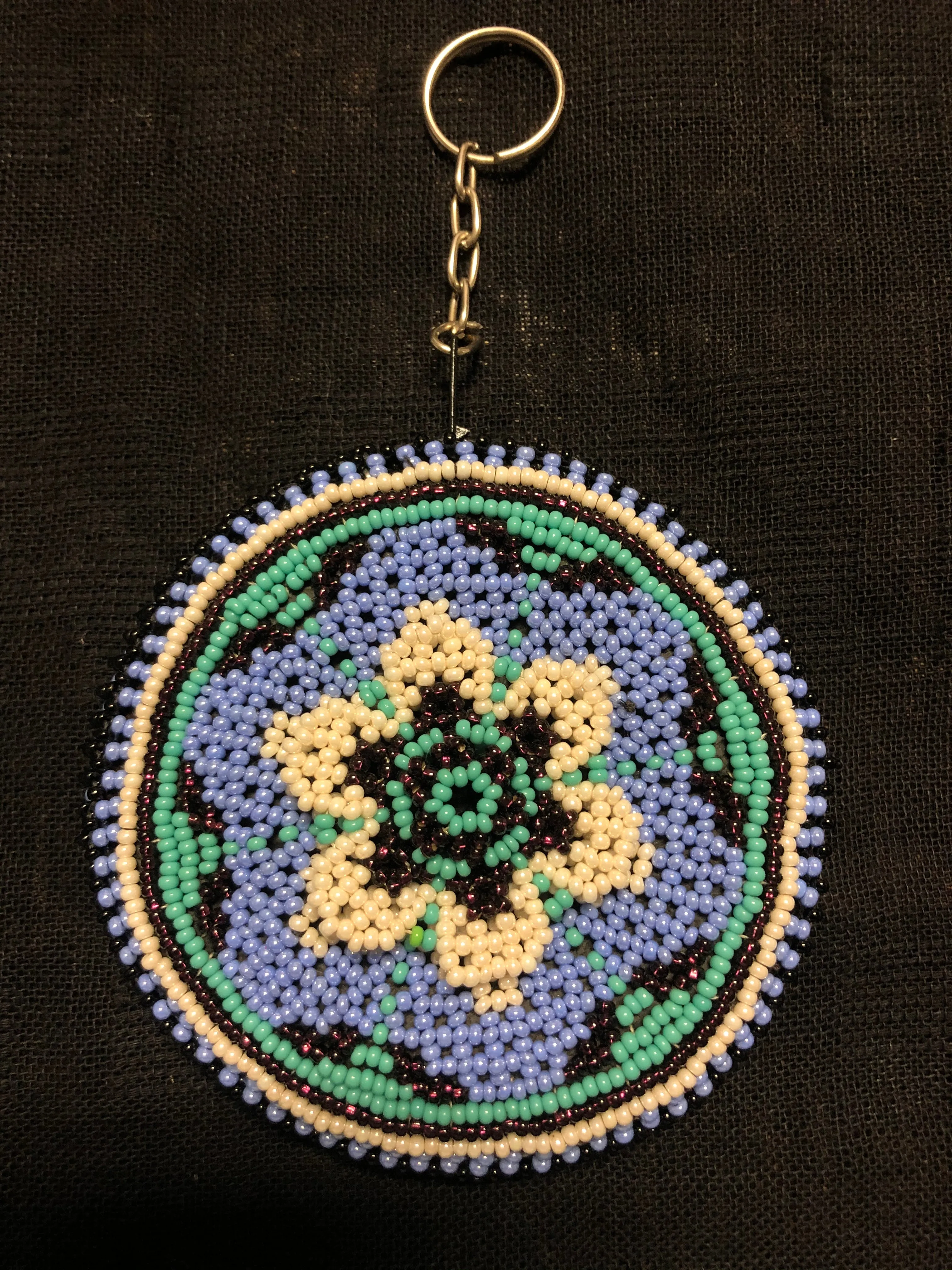 Guatemalan handcrafted glass bead round change purse with key ring. 3.5” diameter.