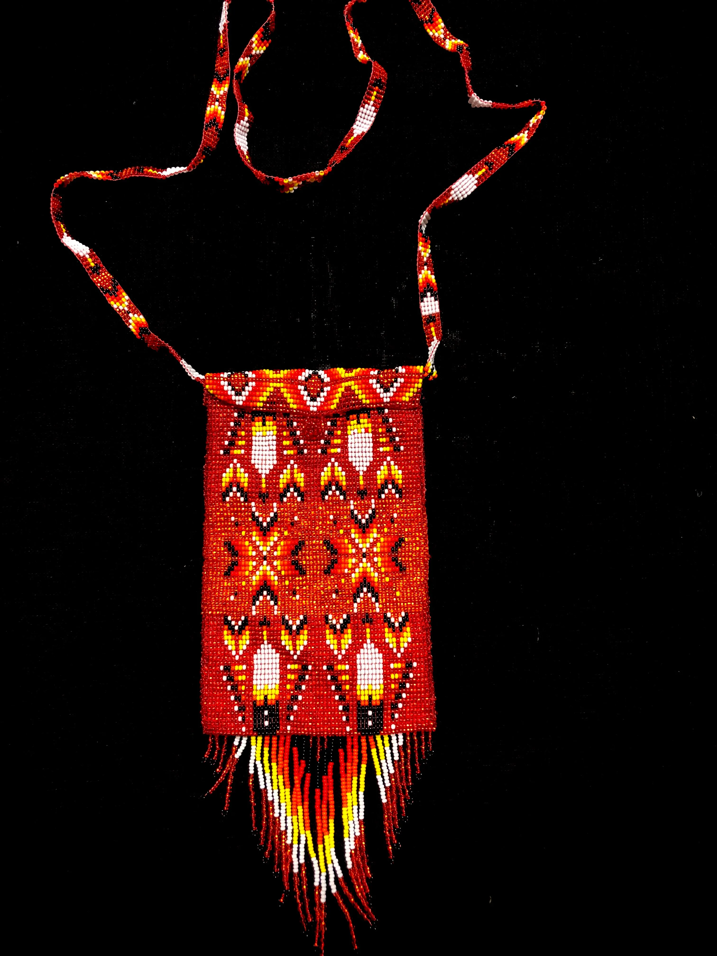 Guatemalan handcrafted glass bead shoulder bag for phone.