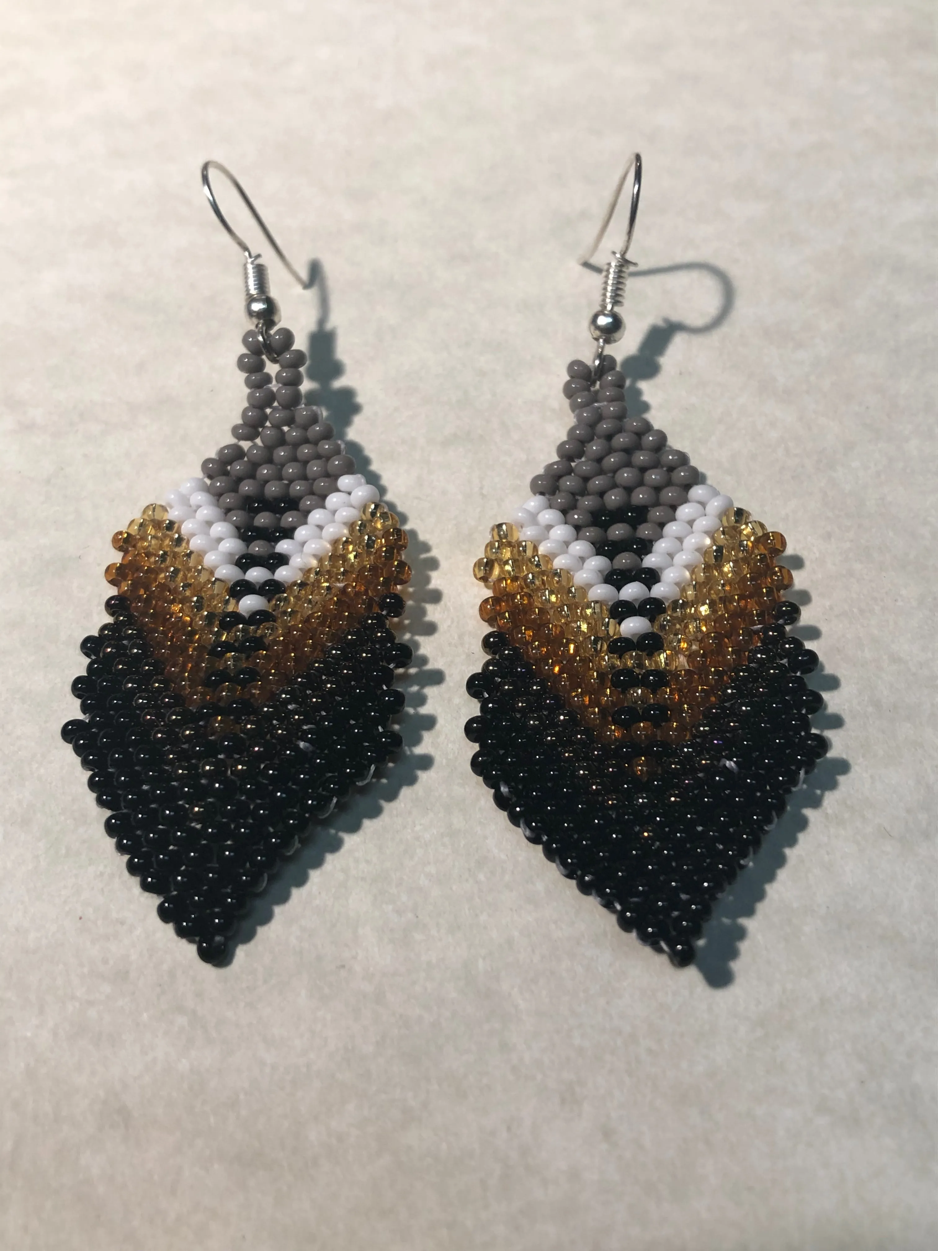 Guatemalan handcrafted glass seed beads earrings in feather design